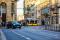 Yellow tram drives along a street. The Berlin tramway German: StraÃÅ¸enbahn Berlin is the main